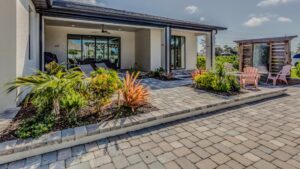 A modern landscape surrounded by beautiful stone pavers.