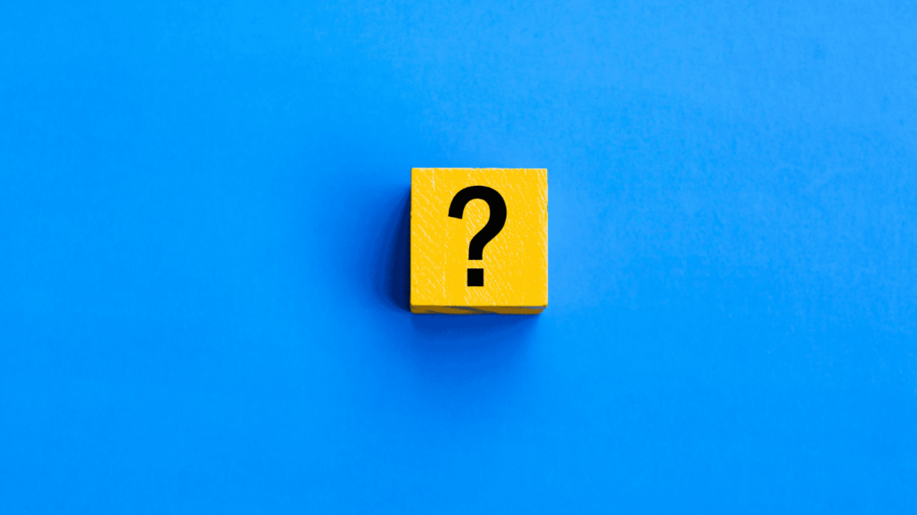 A blue background with a yellow square that has a question mark on it.